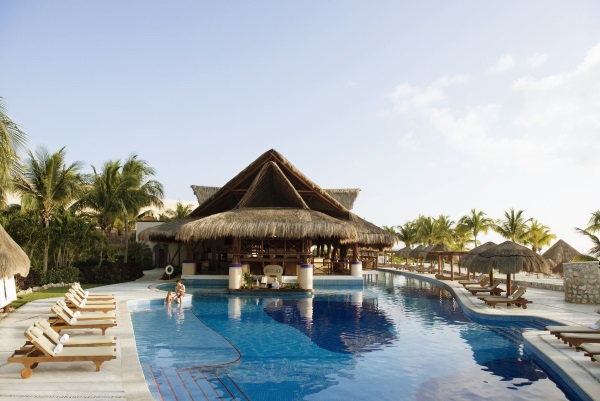 Excellence Riviera Cancun pool and palapas